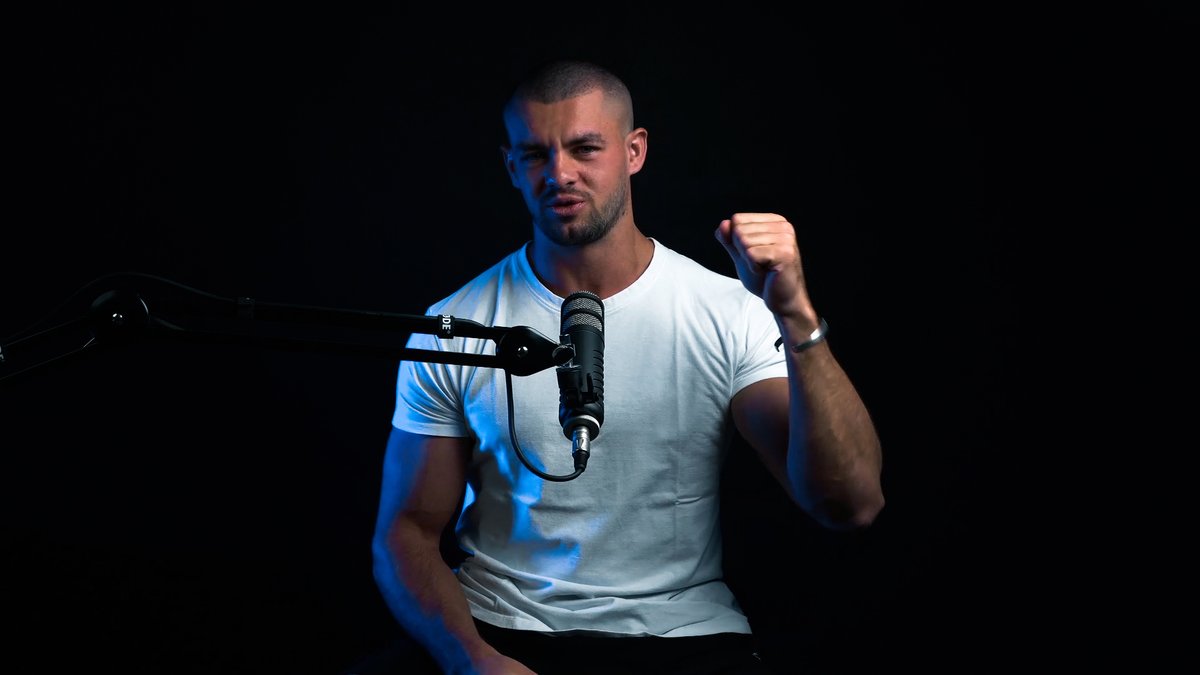 Founder recording the first podcast, 2023
